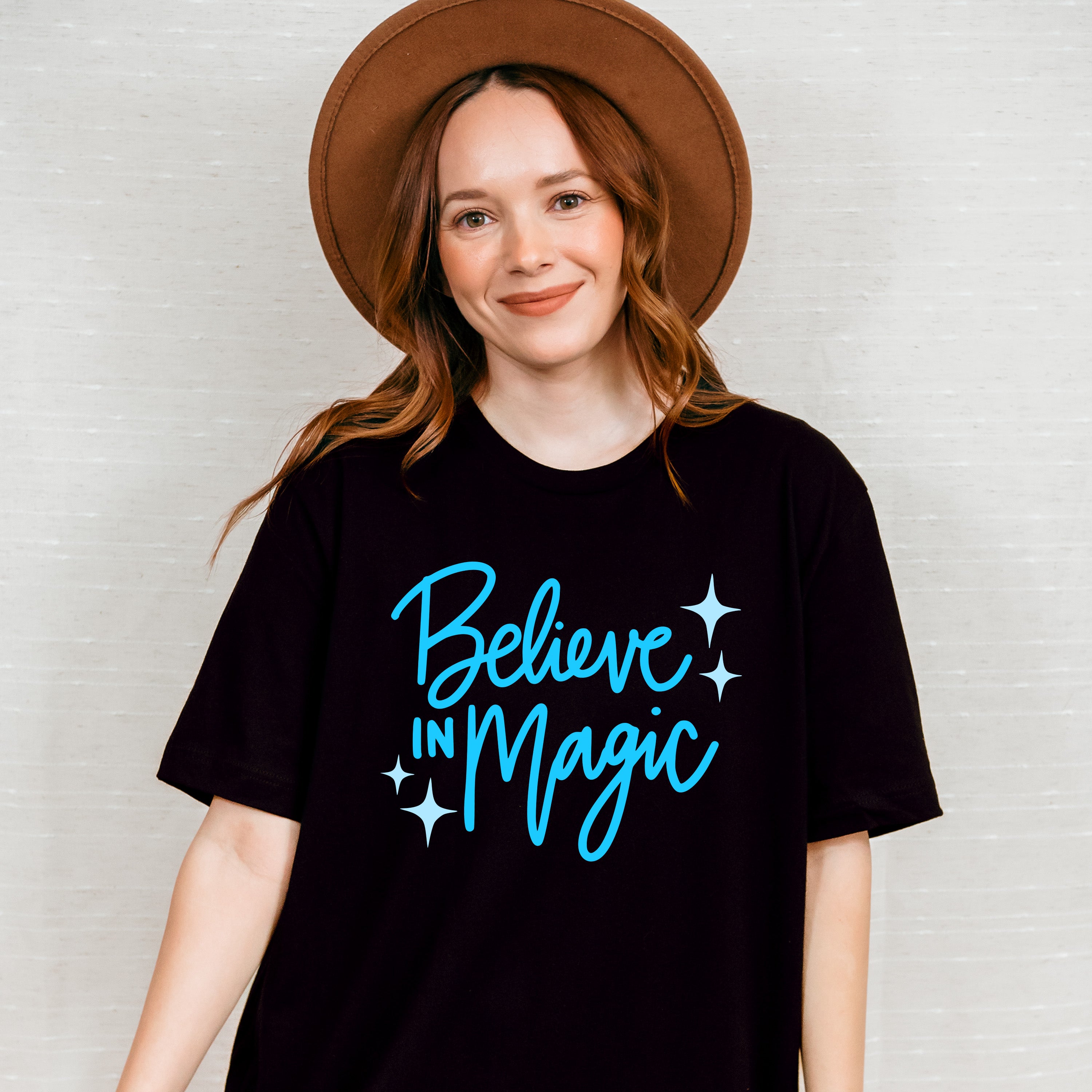 Believe In Magic Blue Cursive Design - Quotes Unisex Crewneck T-Shirt Sweatshirt Hoodie